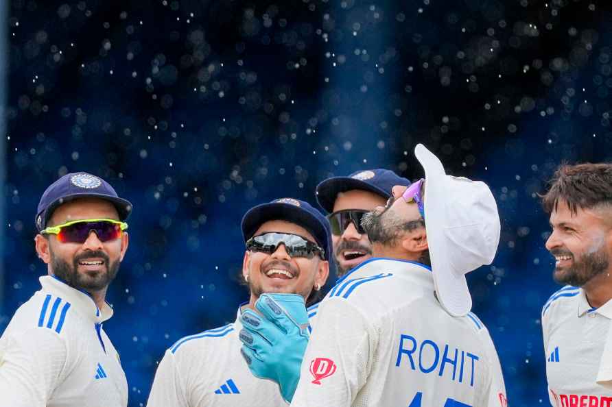 India's captain Rohit Sharma and teammates celebrates the dismissal...