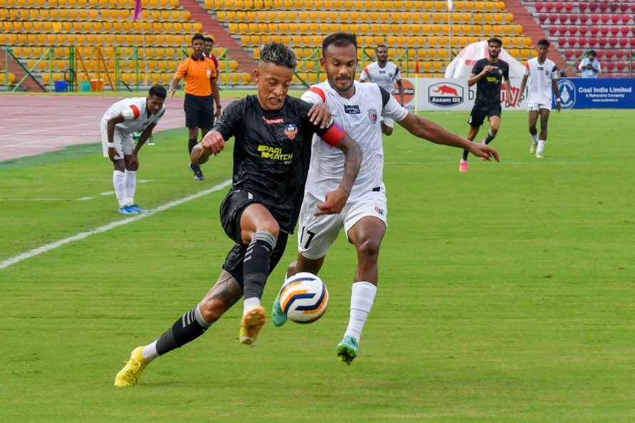 Guwahati: Players of NorthEast United FC (in white) and FC Goa during...