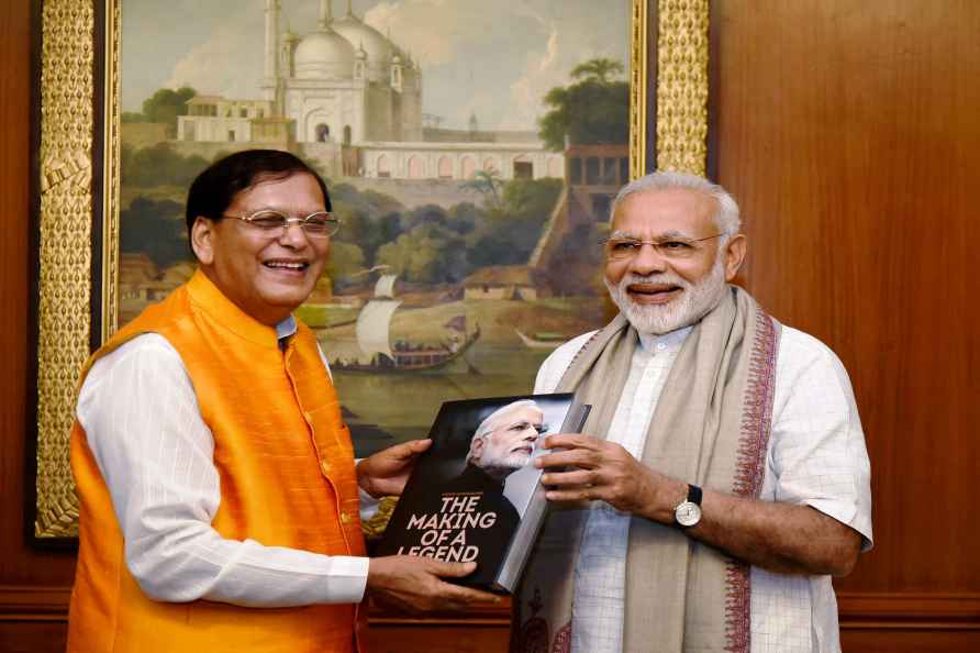 PM receives a book on him