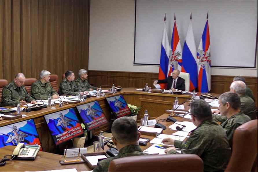 Vladimir Putin meeting with top military brass