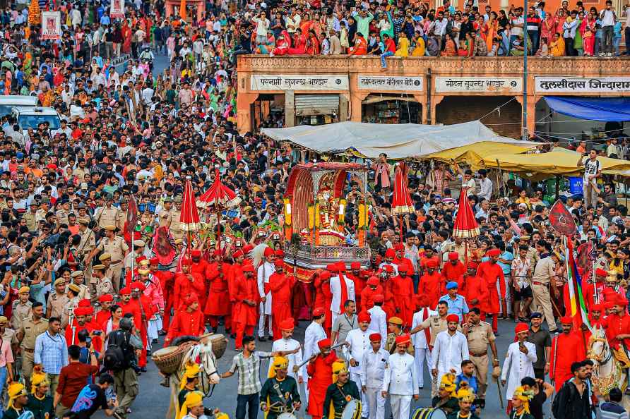 Jaipur: People take part in a traditional procession on the occasion...