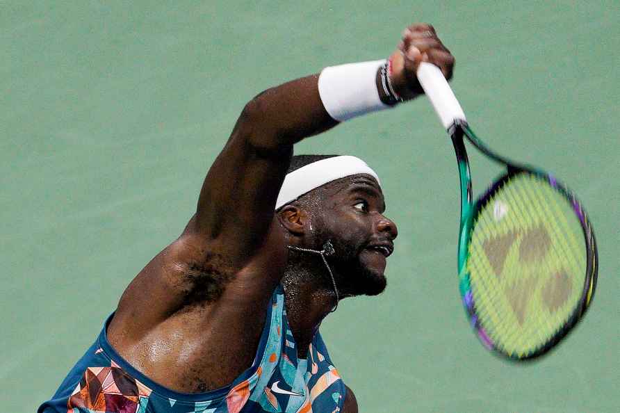 Frances Tiafoe, of the United States, serves to Ben Shelton, of ...