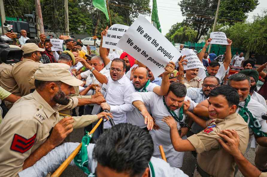 Jammu: Police personnel try to stop Peoples Democratic Party (PDP...