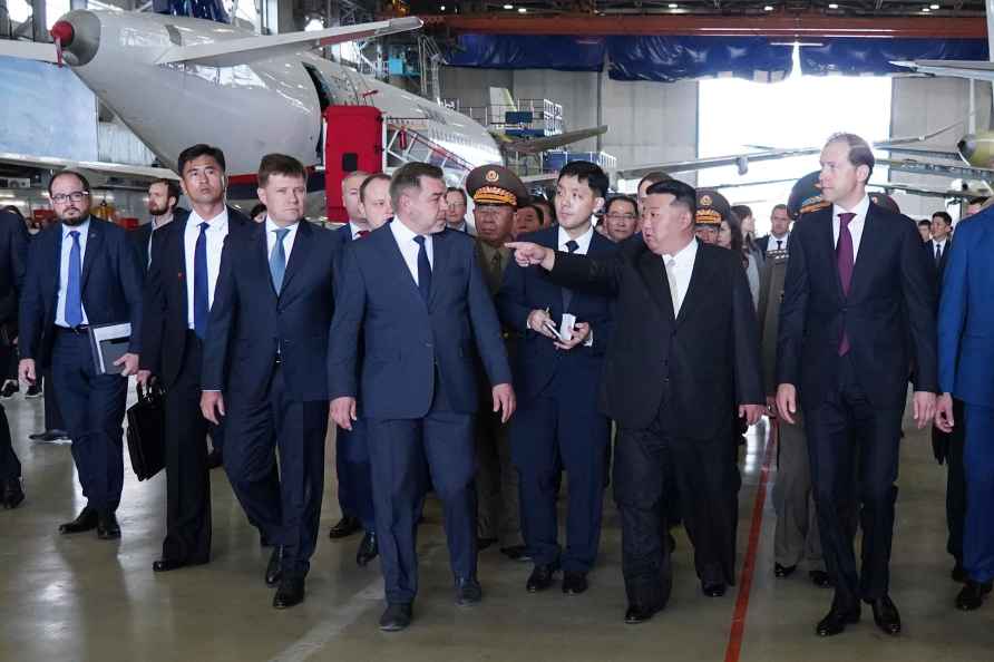 Kim Jong Un visiting aircraft plant