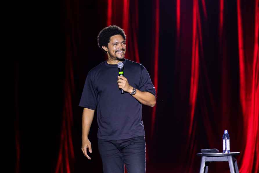 **EDS: TO GO WITH STORY** New Delhi: Comedian Trevor Noah performs...