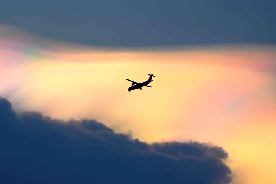 Silhouetted airplane in Chennai