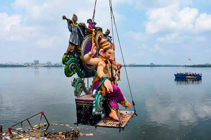 Hyderabad: An idol of Lord Ganesha being immersed into Hussain Sagar...