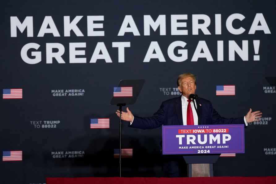 Former President Donald Trump speaks during a commit to caucus rally...