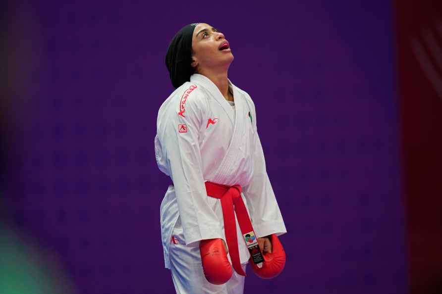 Iran's Sara Bahmanyar reacts after winning against Japan's Miho ...