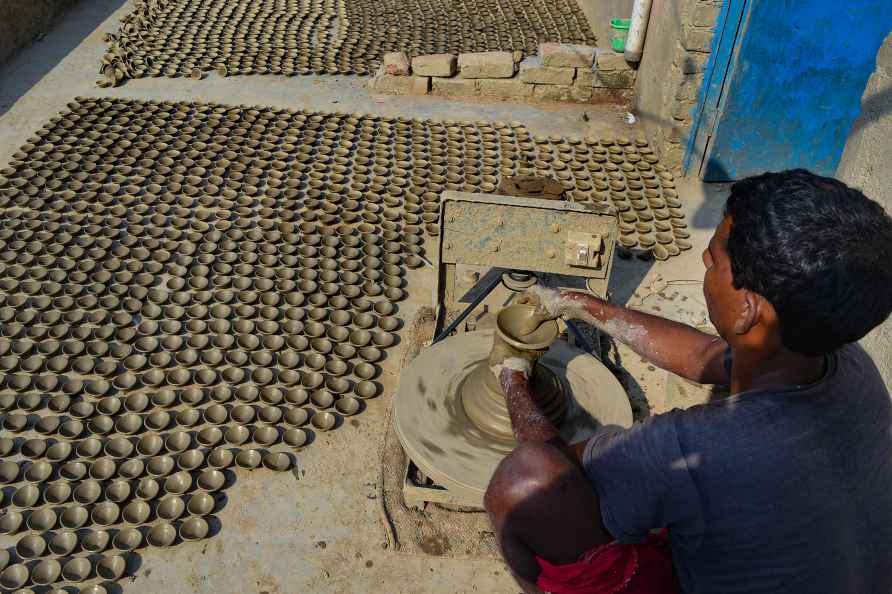 Mathura: A potter makes earthen lamps ahead of Diwali festival, ...