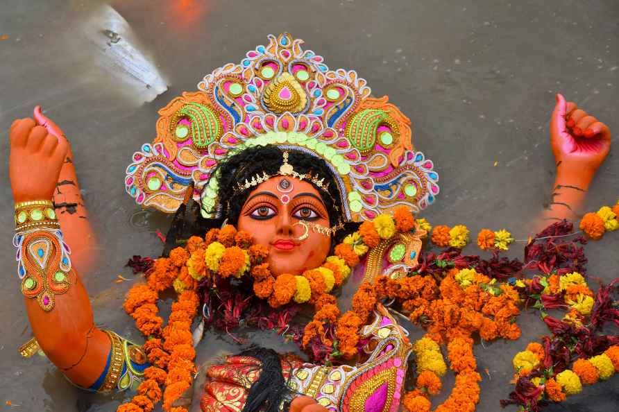 Guwahati: A clay idol of Hindu goddess Durga floats during immersion...