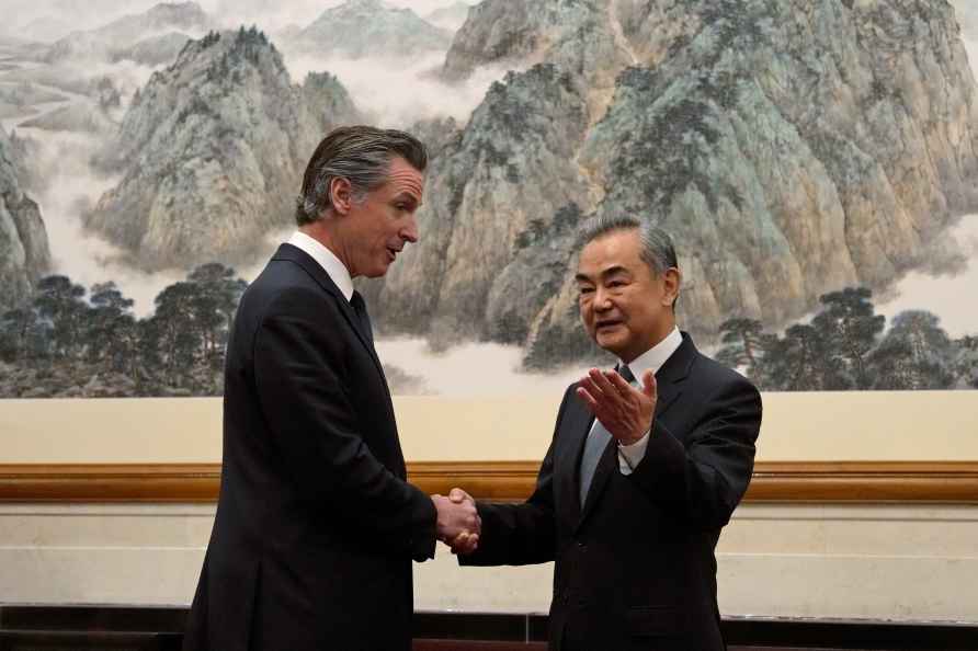 Gavin Newsom with China's Wang Yi