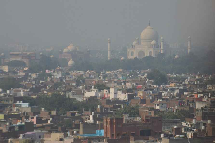 Agra: The Taj Mahal is seen in the backdrop of smog-covered city...