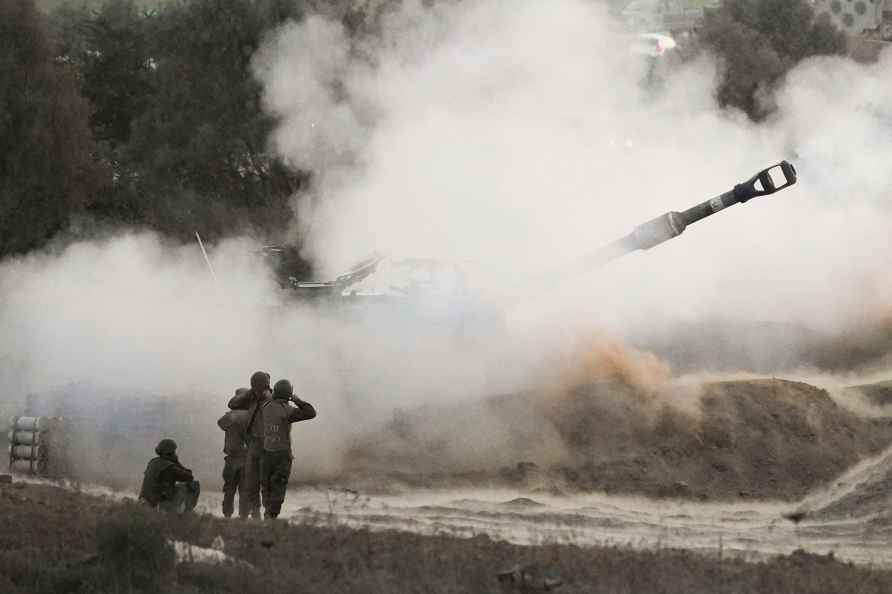 An Israeli mobile artillery unit fires a shell