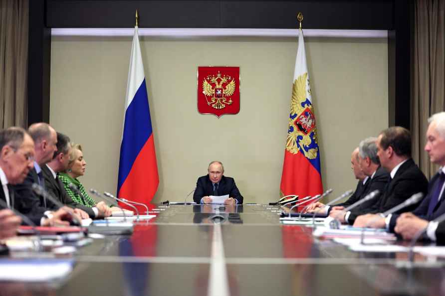 Russian President Vladimir Putin, center, leads the meeting with...