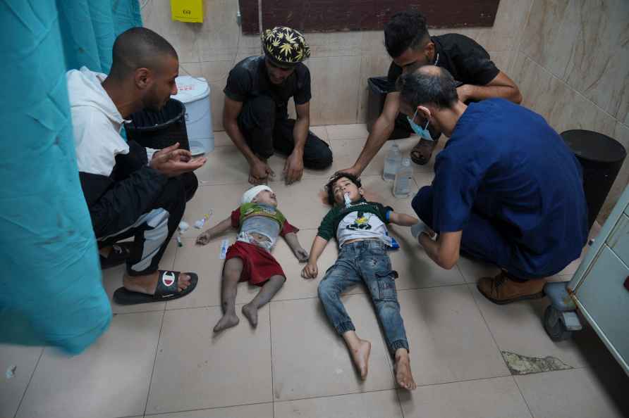 Palestinian children wounded in Israeli bombardment are brought ...