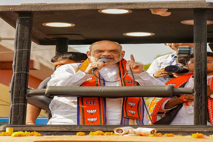 Dhar: Union Home Minister Amit Shah during a road show ahead of ...