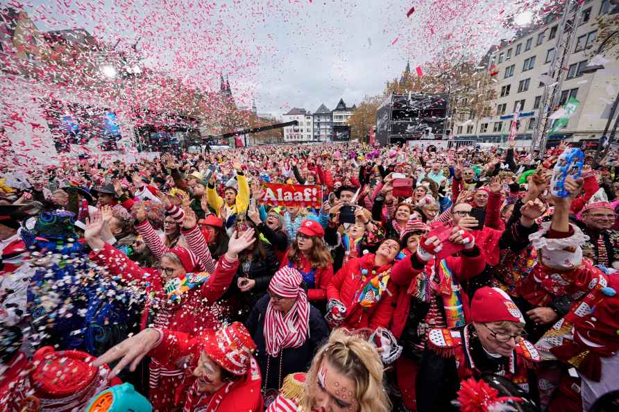 Carnival revellers celebrate on the central Heumarkt square