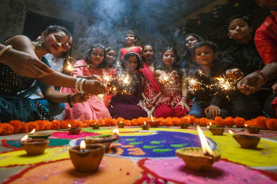 Patna: Young women during Diwali celebrations, in Patna, Saturday...