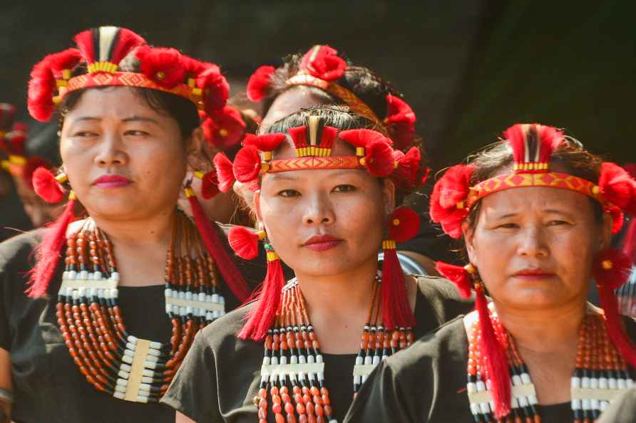 Chumukeidma: Women in traditional attire gesture during the celebration...