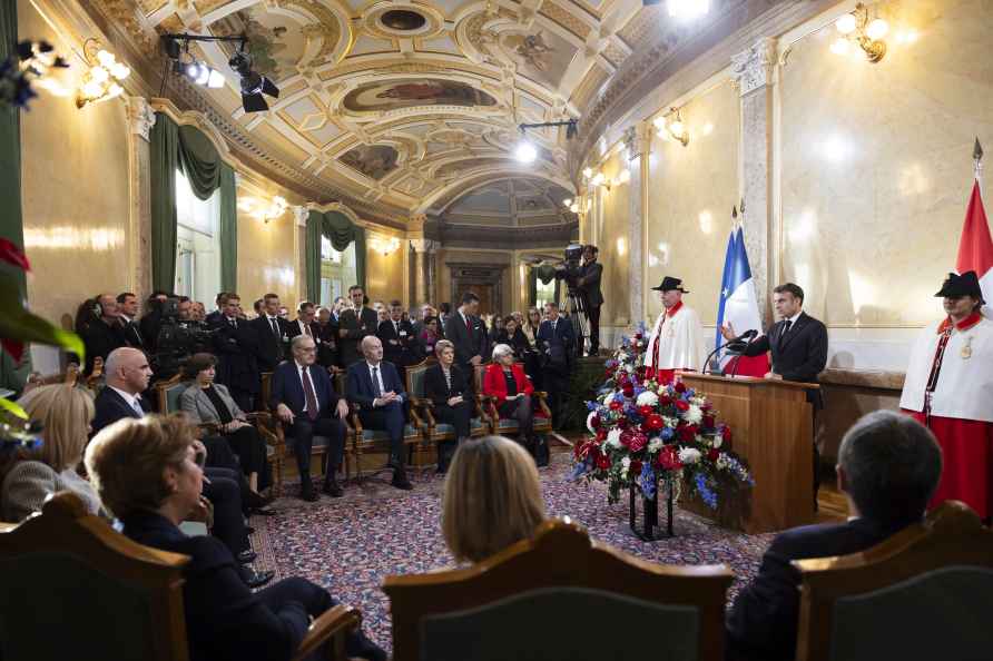 French President Emanuel Macron, right, gestures as he speaks during...