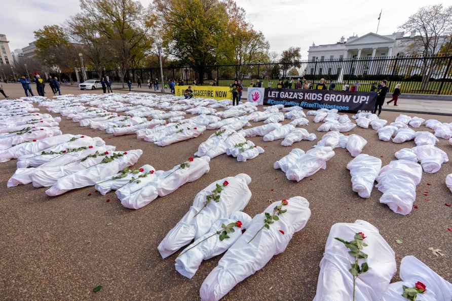 Avaaz activists placed body bags