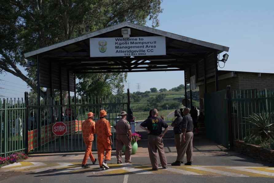 K-9 officers gather at the entrance of Atteridgeville Prison