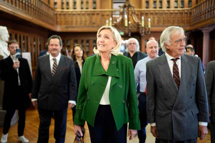 French far-right leader Marine Le Pen, center, visits the Portuguese...