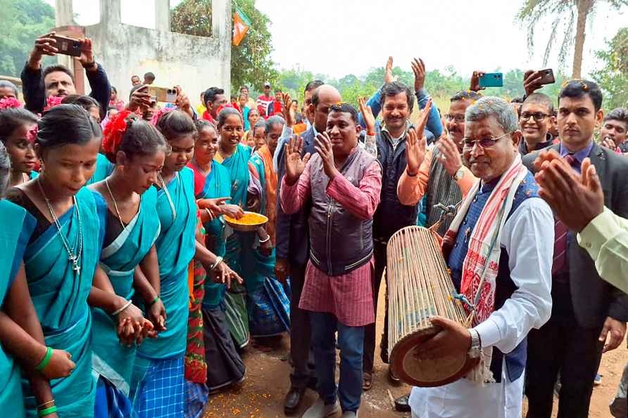 Pakur: Jharkhand BJP President Babulal Marandi plays with a traditional...