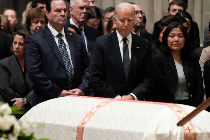 President Joe Biden and Acting Secretary of Labor Julie Su attend...