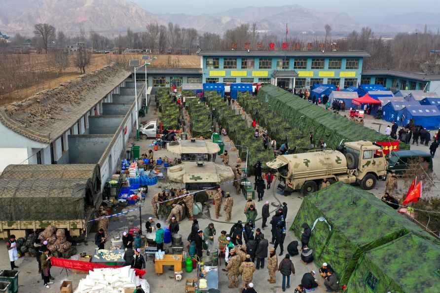 Volunteers preparing foods to quake victims