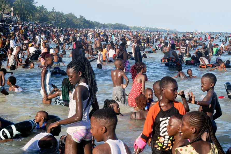 Holiday makers enjoys a day on the beach