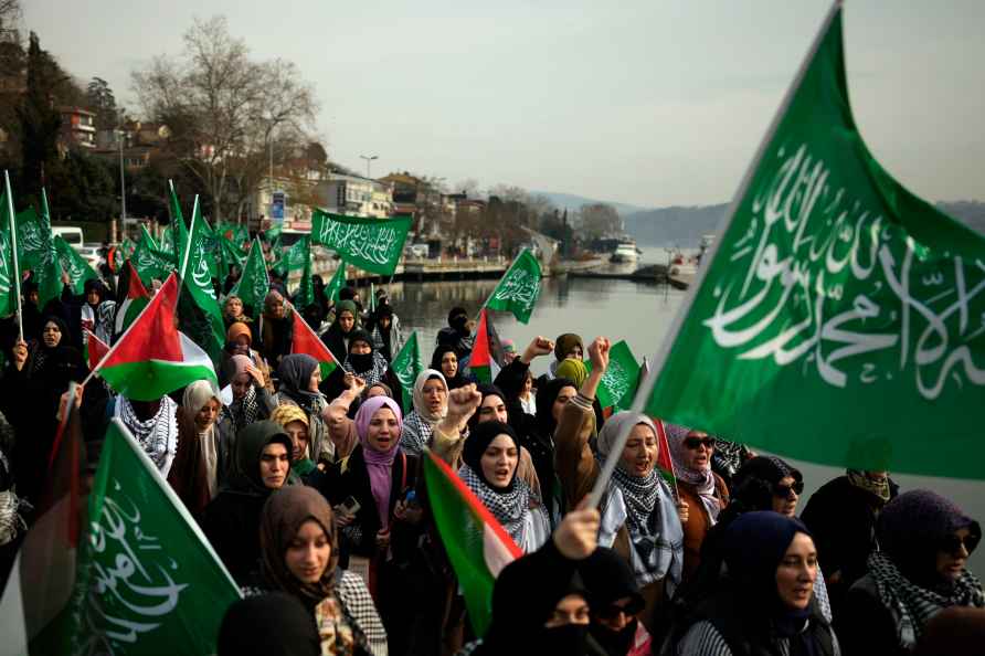 Demonstrators chant slogans outside the U.S. consulate,