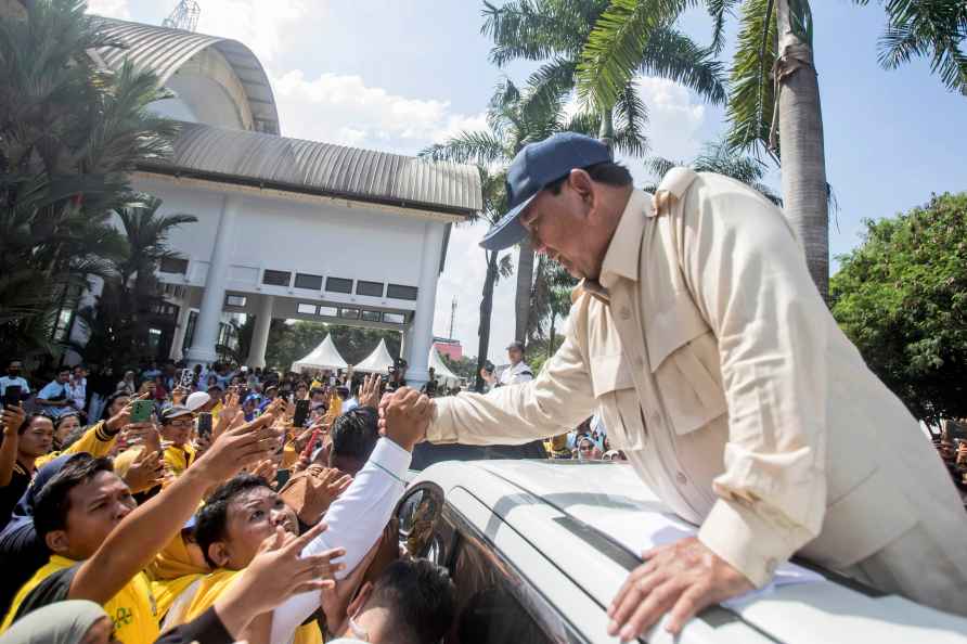 Presidential candidate Prabowo Subianto greets supporters during...