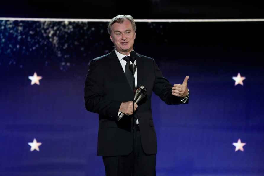 Christopher Nolan accepts the award for best director for 