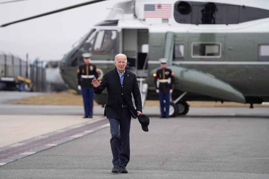 President Joe Biden walks from Marine One as he arrives at Hagerstown...