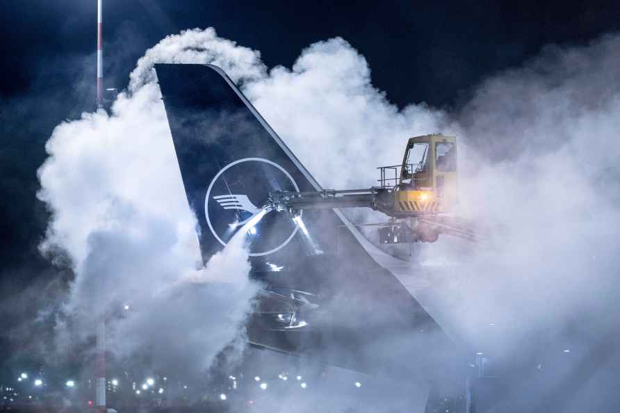 A Lufthansa aircraft is de-iced at Frankfurt