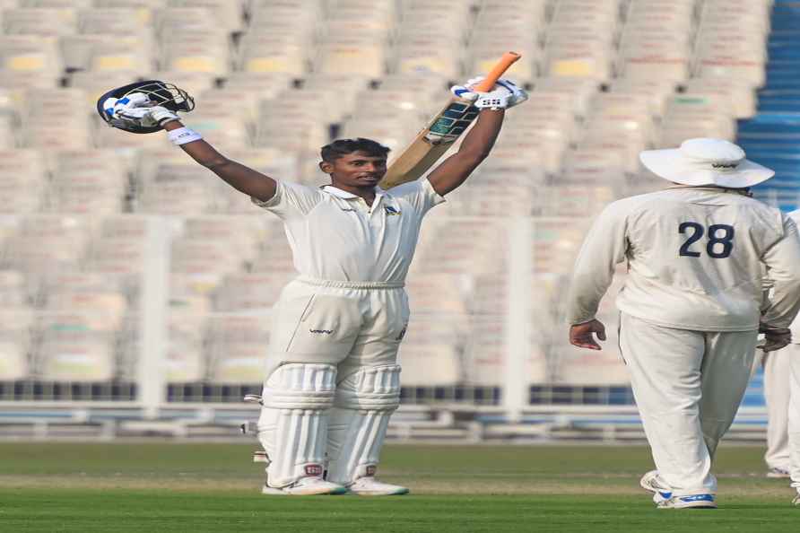 Kolkata: Bengal batter Abishek Porel celebrates his century during...