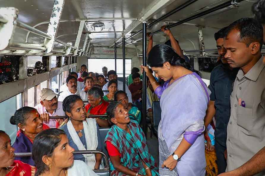 YS Sharmila interacts with bus passengers