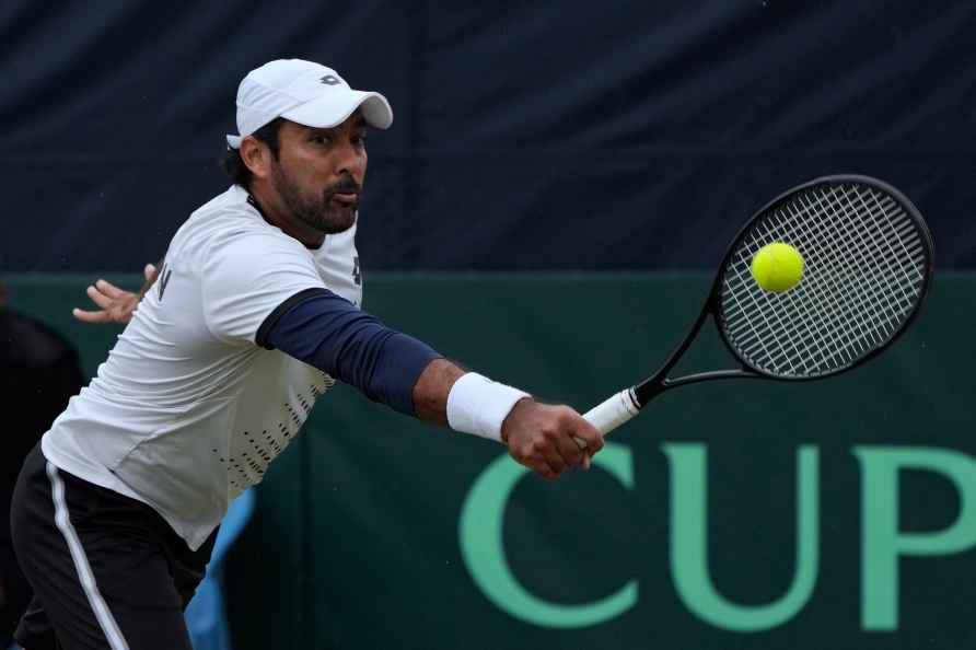 Pakistan's Aisam-ul-Haq plays a return shot against India's Ramkumar...