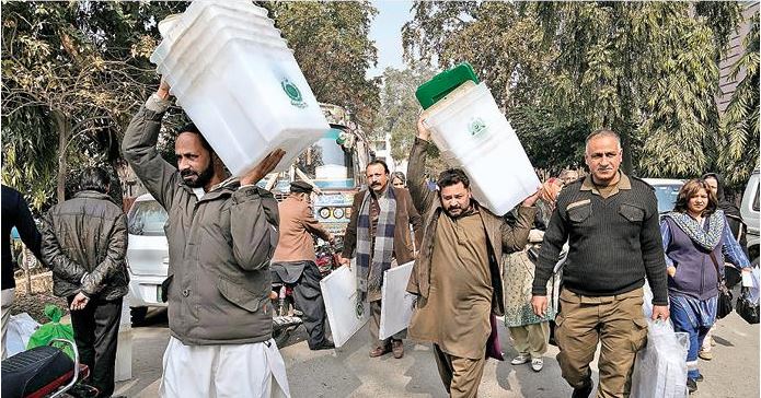 Pakistan polls: Voting underway, security officer killed