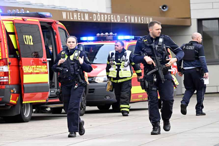 Police and ambulances at the scene of an attack