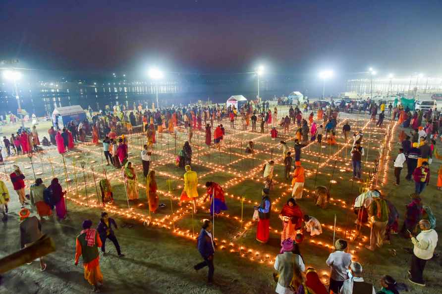 Prayagraj: Hindu Devotees light oil lamps near stands tridents ('...