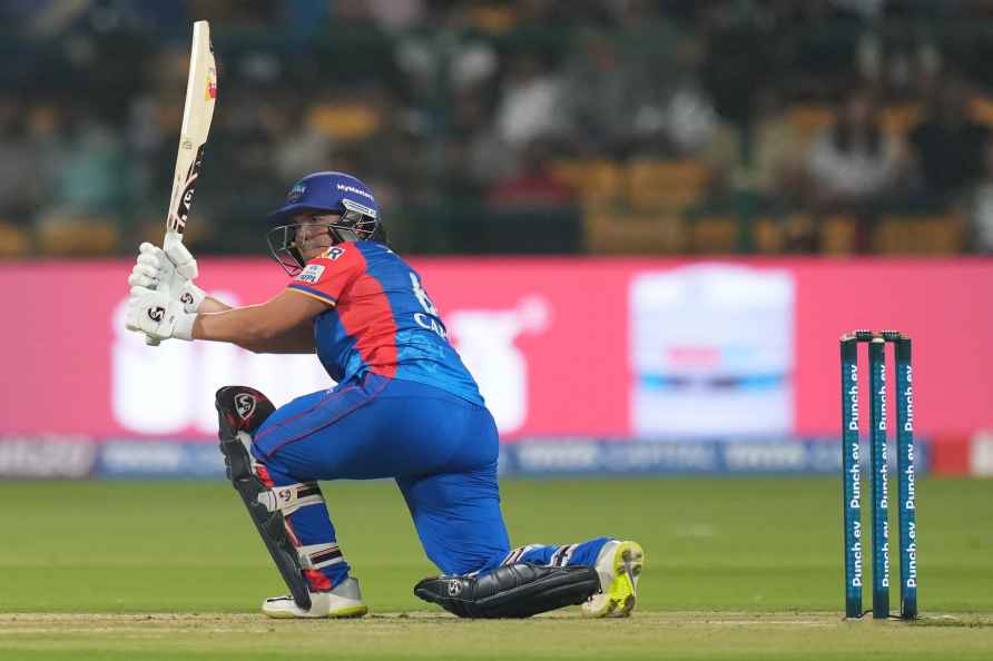 Bengaluru: Delhi Capitals batter Alice Capsey plays a shot during...