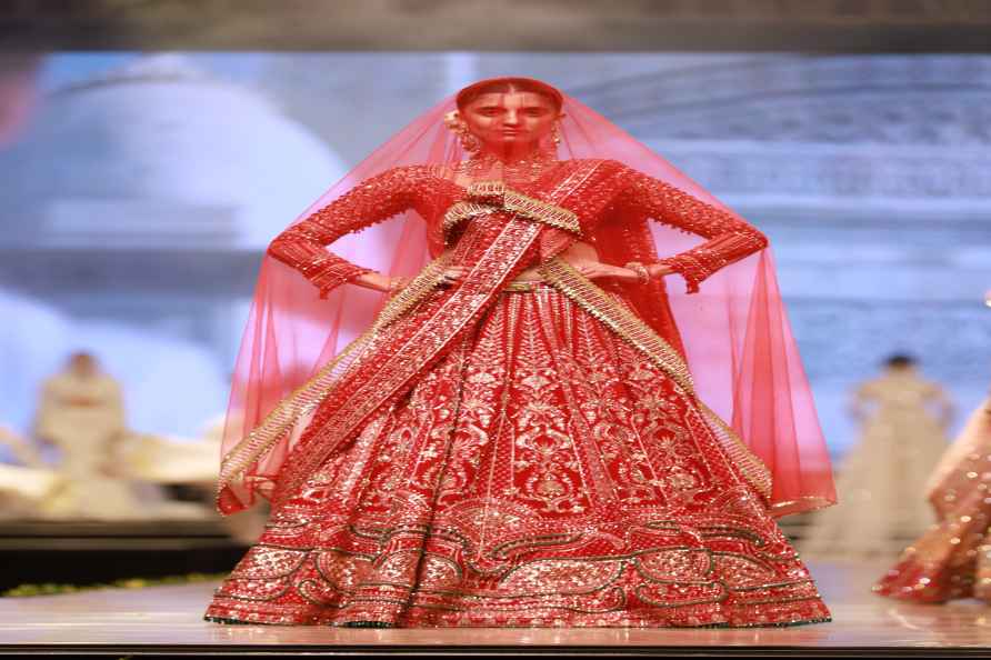 New Delhi: A model at a fashion show during the Bharat Tex 2024, ...