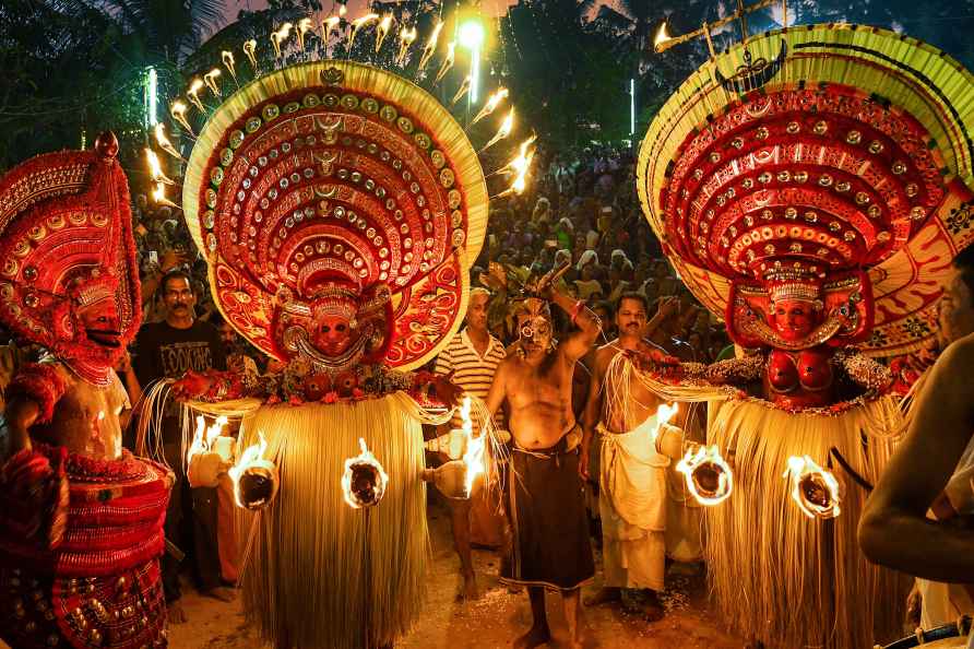 Theyyam artists perform