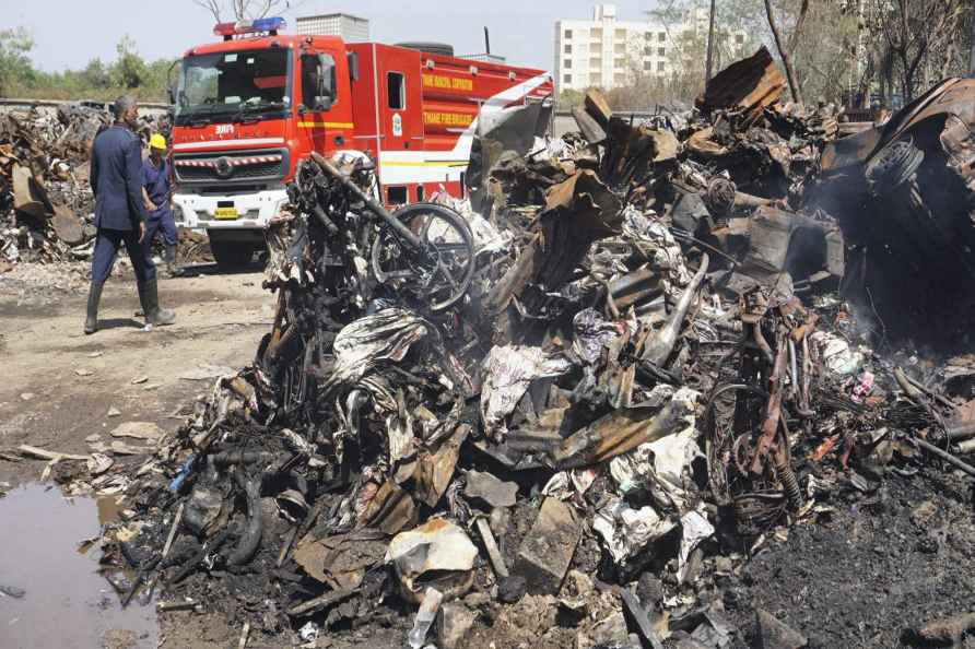 Firefighters at scrap yard in Thane