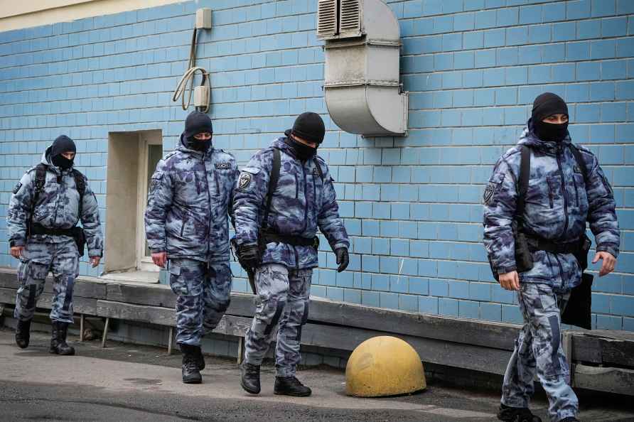 Police officers walk near the Basmanny District Court