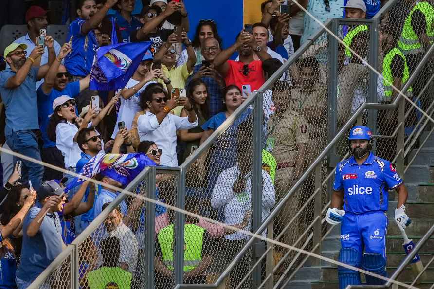 Mumbai: Mumbai Indians' Rohit Sharma comes to the ground during ...