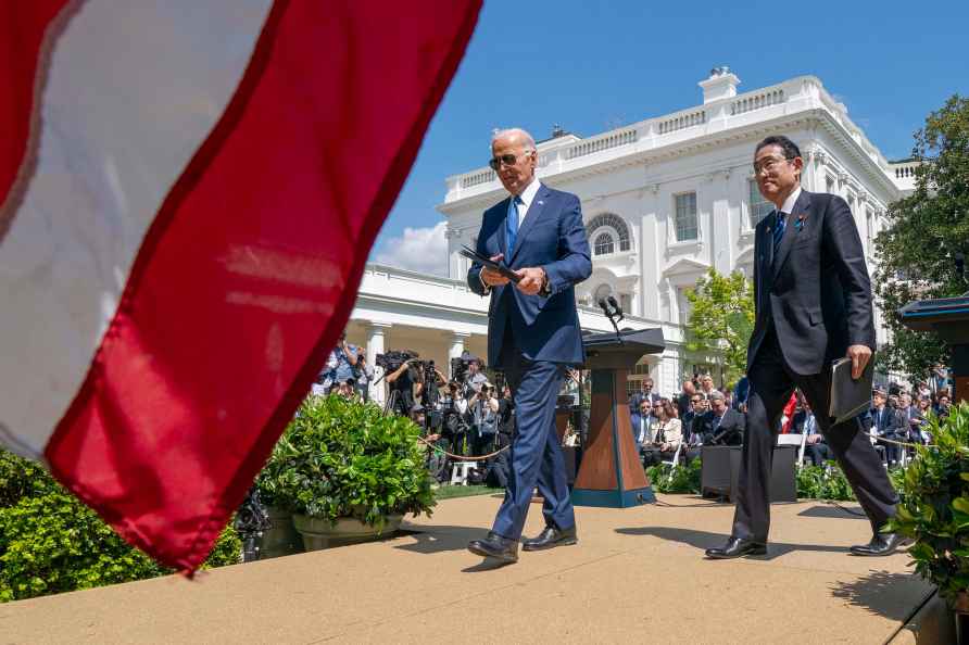 President Joe Biden, left, and Japanese Prime Minister Fumio Kishida...